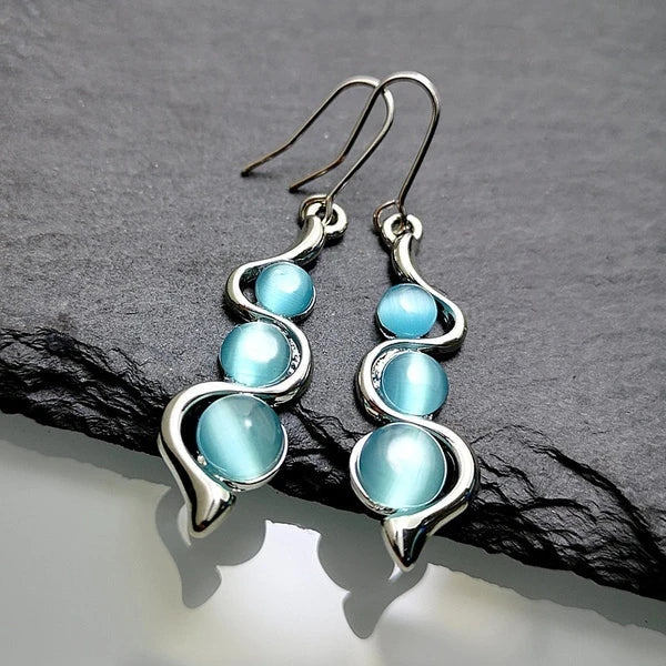 Celestia™ | Boucles d'oreilles pendantes en cristal bleu scintillant