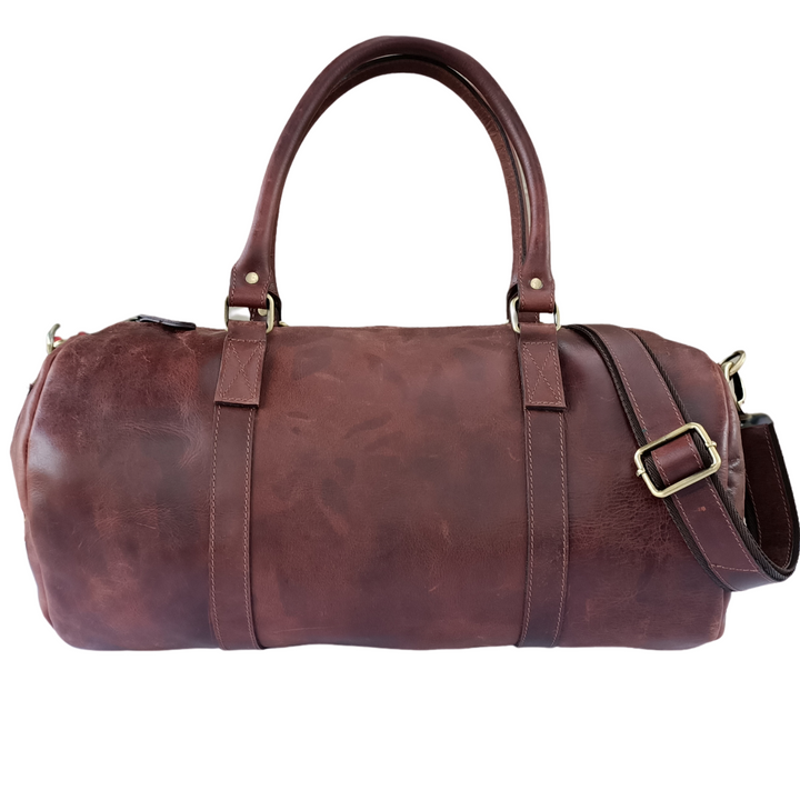 Sac de voyage en cuir brun en ton foncé