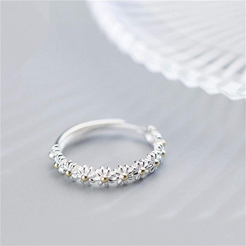 Bague en argent ajustable et émaillée à la main en forme de marguerite