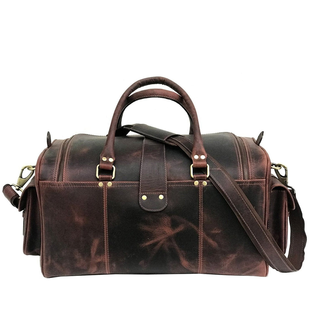 "Week-end en cuir brun foncé de Zwei Taschen" pourrait être reformulé en "Sacs de week-end brun foncé de Zwei Taschen".