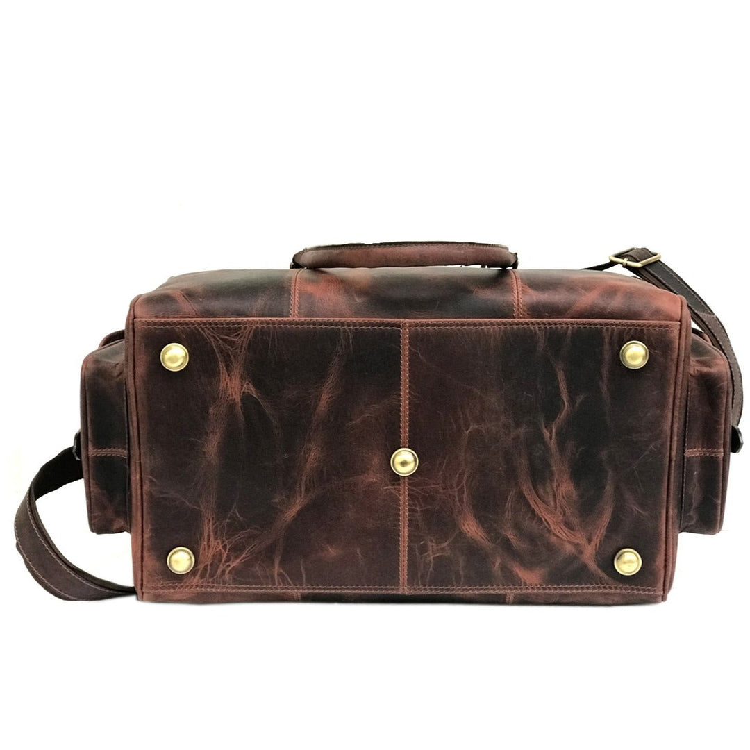 "Week-end en cuir brun foncé de Zwei Taschen" pourrait être reformulé en "Sacs de week-end brun foncé de Zwei Taschen".