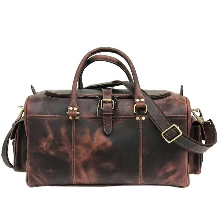 "Week-end en cuir brun foncé de Zwei Taschen" pourrait être reformulé en "Sacs de week-end brun foncé de Zwei Taschen".