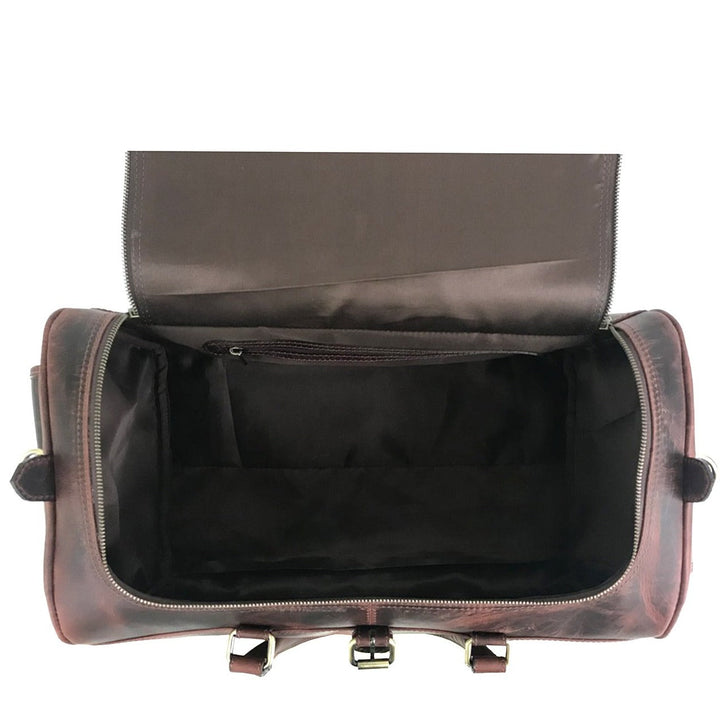 "Week-end en cuir brun foncé de Zwei Taschen" pourrait être reformulé en "Sacs de week-end brun foncé de Zwei Taschen".