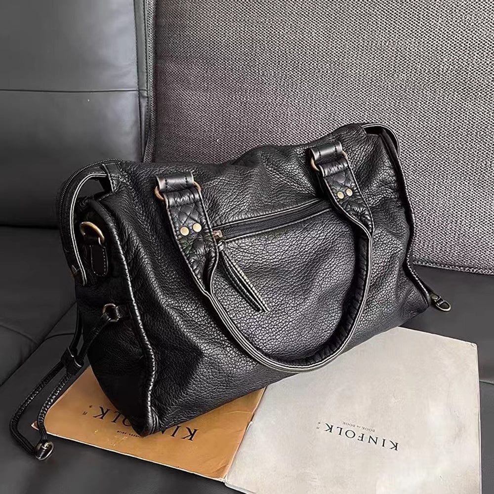 Sac à main en cuir noir vintage élégant
