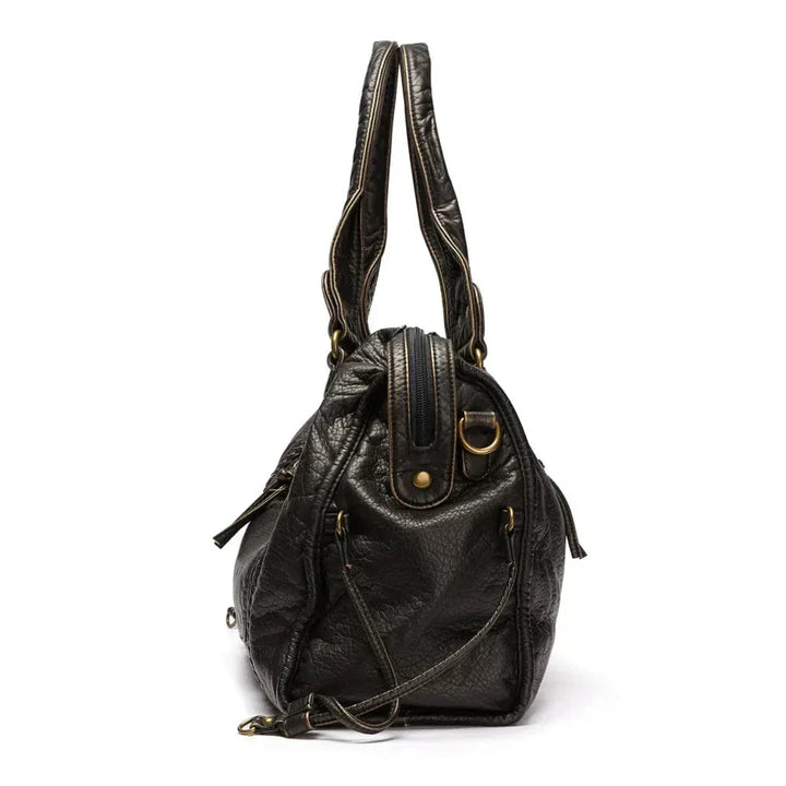 Sac à main en cuir noir vintage élégant