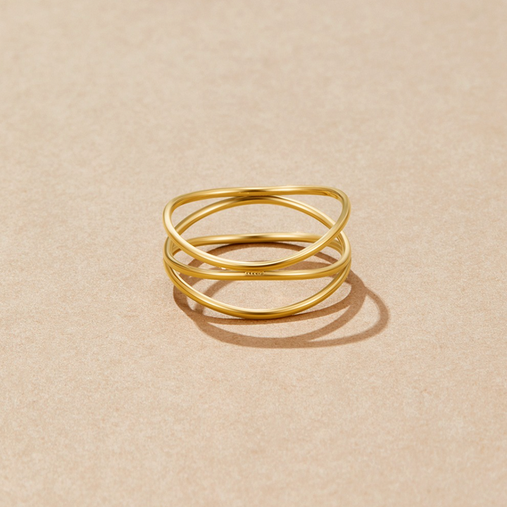 “Boucle Infini - Or” → “Infinite Loop - Gold”