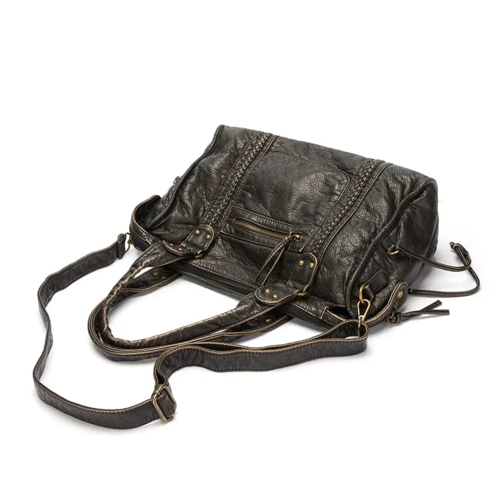 Sac à main en cuir noir vintage élégant
