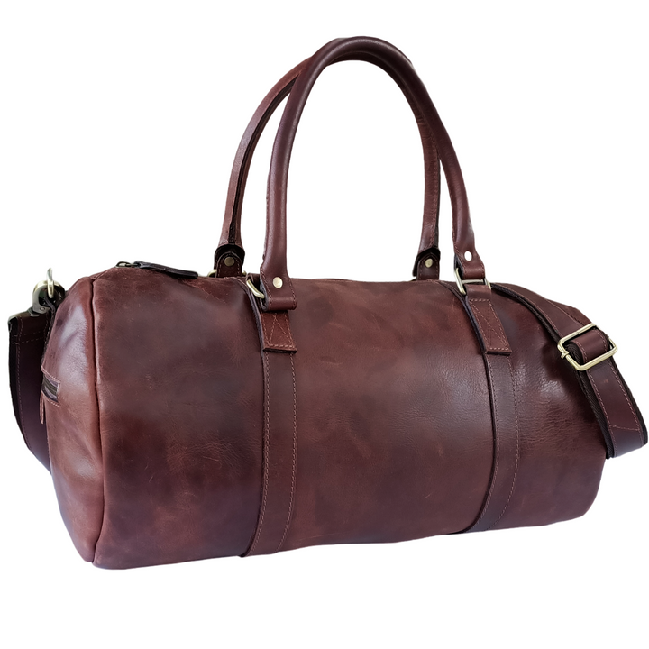Sac de voyage en cuir brun en ton foncé