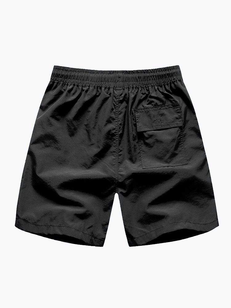 Chemise à boutons imprimée florale tropicale et shorts de bain