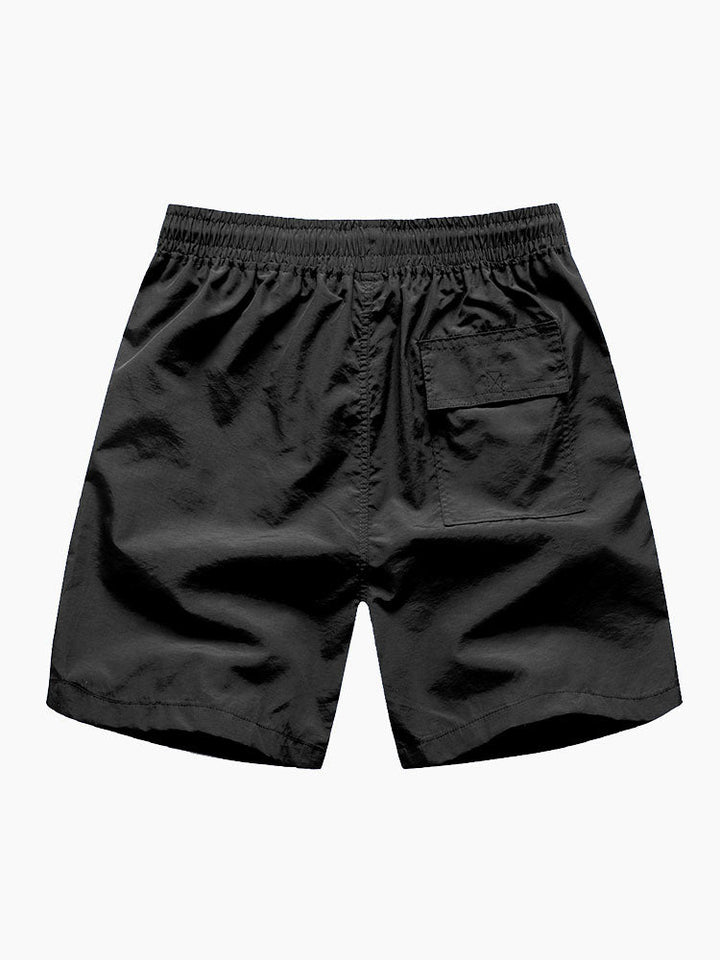 Chemise à boutons imprimée florale tropicale et shorts de bain