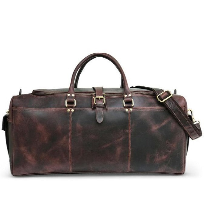 "Sac de week-end en cuir Hunter brun foncé" peut être reformulé en "Sac de week-end en cuir Hunter brun foncé".