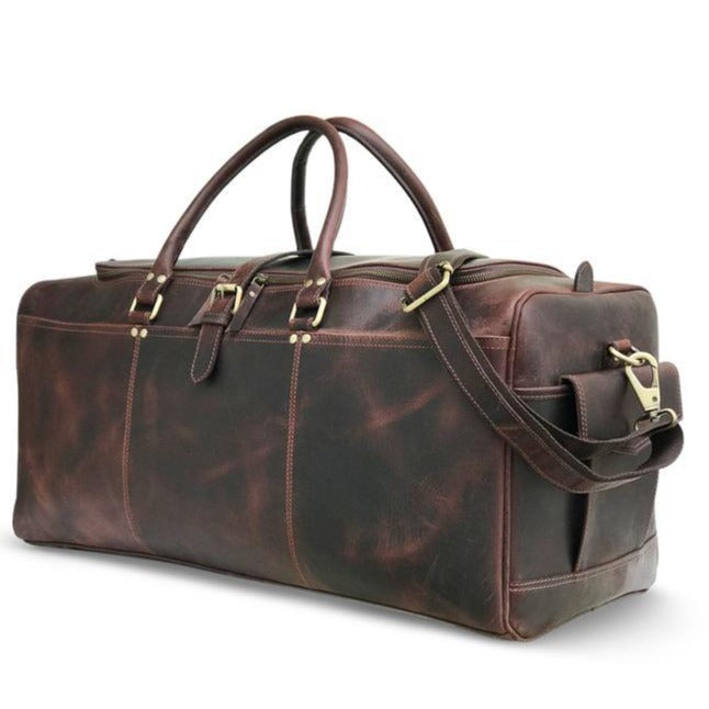 "Sac de week-end en cuir Hunter brun foncé" peut être reformulé en "Sac de week-end en cuir Hunter brun foncé".