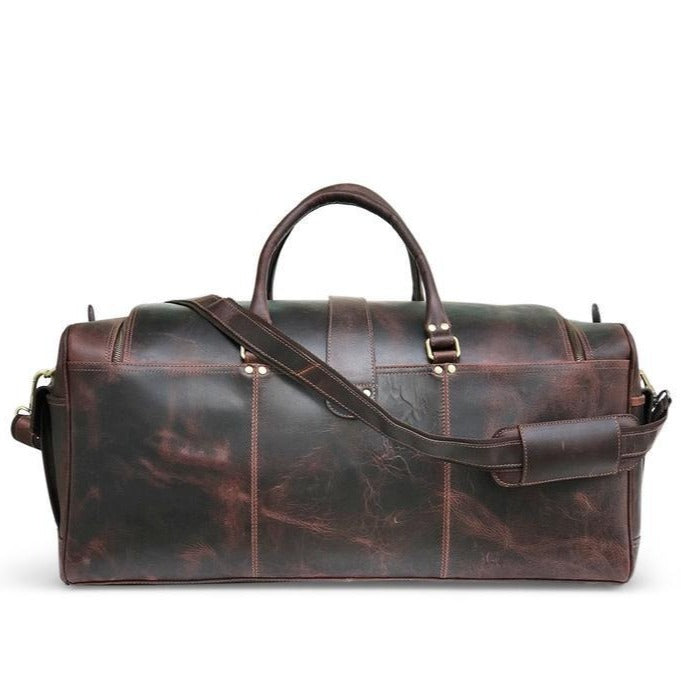 "Sac de week-end en cuir Hunter brun foncé" peut être reformulé en "Sac de week-end en cuir Hunter brun foncé".
