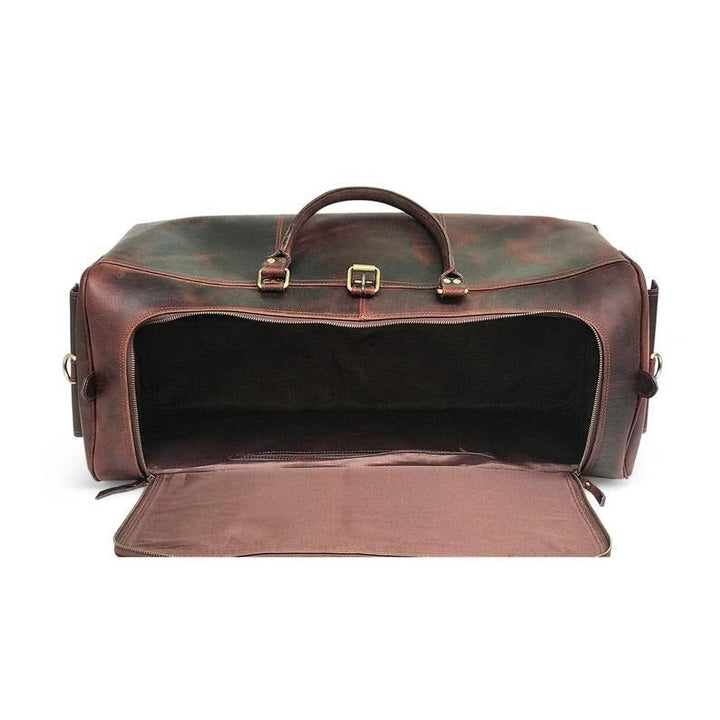 "Sac de week-end en cuir Hunter brun foncé" peut être reformulé en "Sac de week-end en cuir Hunter brun foncé".
