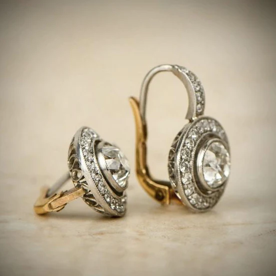 Boucles d'oreilles vintage en or et argent avec cristal