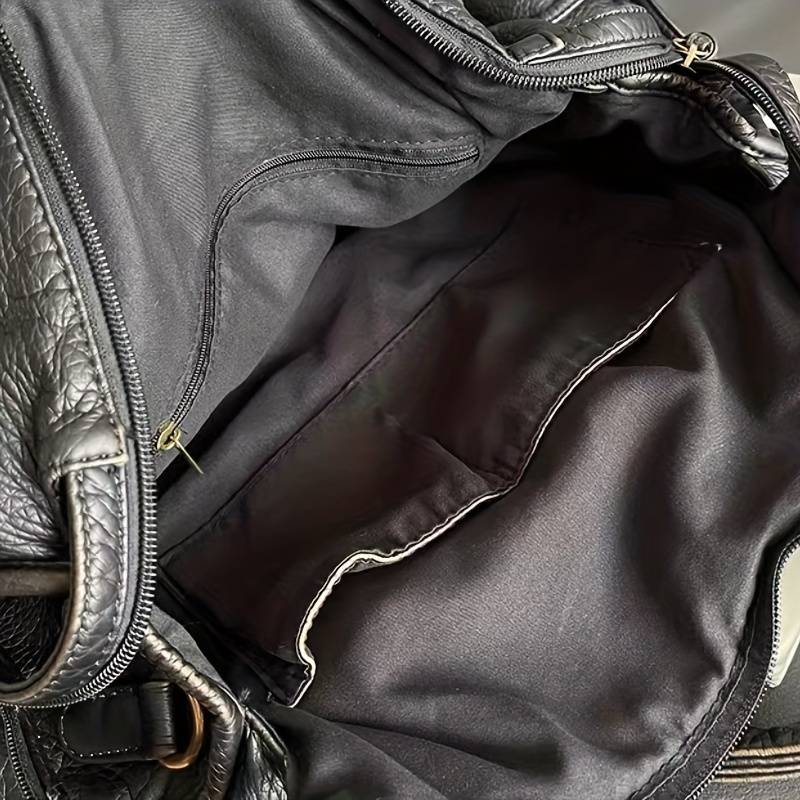 Sac à main en cuir noir vintage élégant
